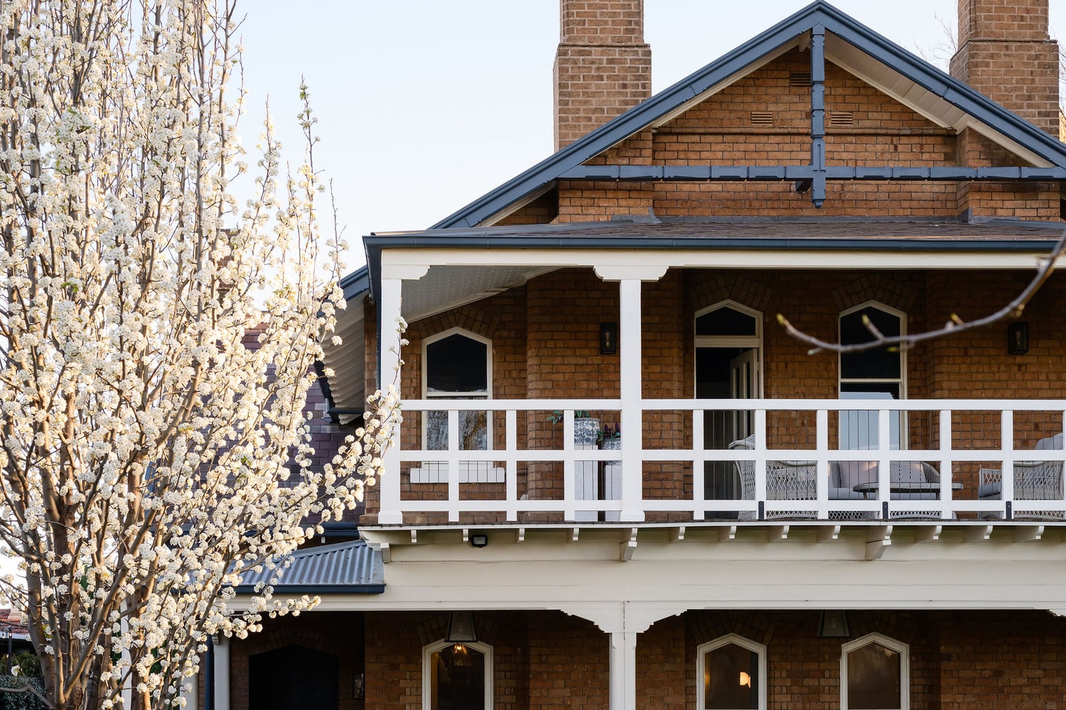 Spring blossom beside the restored 1896 homestead at Yallungah Boutique Hotel, Orange NSW