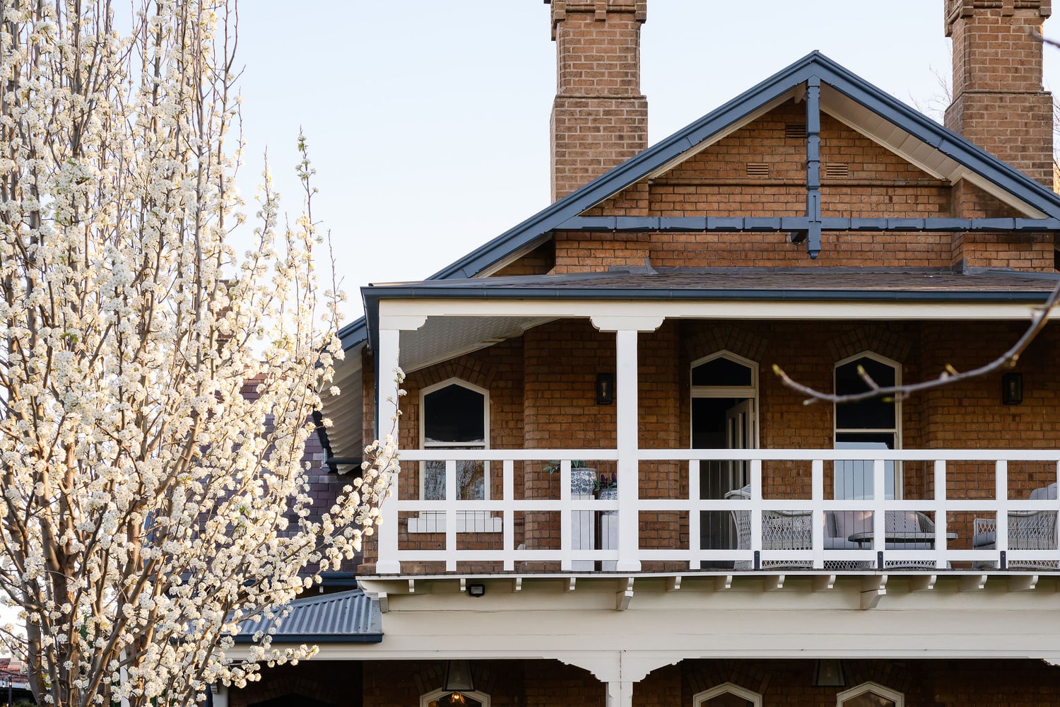 Spring blossom beside the restored 1896 homestead at Yallungah Boutique Hotel, Orange NSW